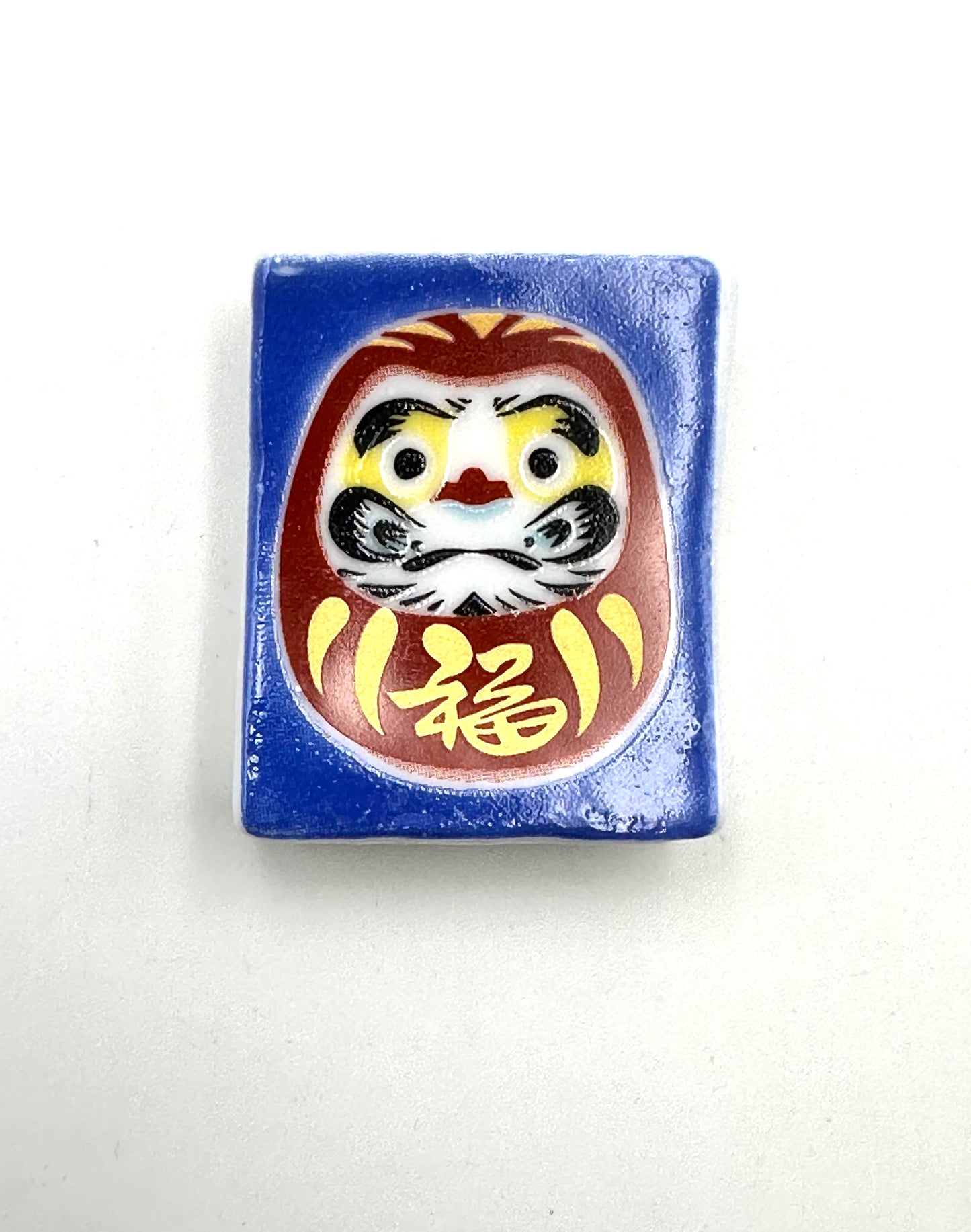 Poggia bacchette Daruma